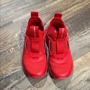 Kids Red Skechers slip on sneakers